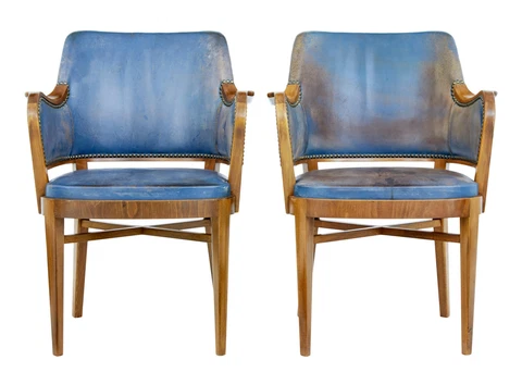 PAIR OF MID 20TH CENTURY TEAK AND LEATHER ARMCHAIRS Cover