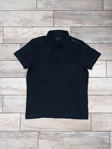 Camiseta polo para hombre CALVIN KLEIN JEANS en negro talla mediana - Imagen 1 de 8