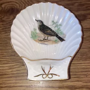 Plato vintage Lourioux Le Faune a prueba de fuego porcelana con motivo de pájaro concha marina, 5-1/2" - Imagen 1 de 4