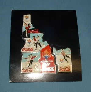 Pinbacks de Coca Cola de los Juegos Olímpicos de Salt Lake City 2002 (5 artículos) - estado usado - Imagen 1 de 3