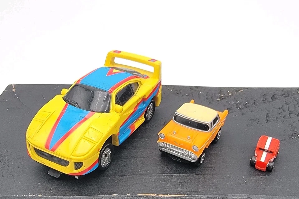 RARO Micro Máquinas FERRARI F40 + 57 CHEVY + 32 HOT ROD Triplesider Galoob 1990 Foto 1 de 4