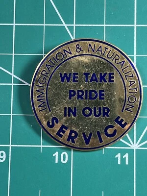 Obsolete Immigration and Naturalization We Take Pride i Our Service Obsolete Pin - Image 1 of 2