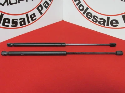 Juego de 2 soportes de pestillo de capó Dodge RAM NUEVO OEM MOPAR de repuesto Foto 1 de 4