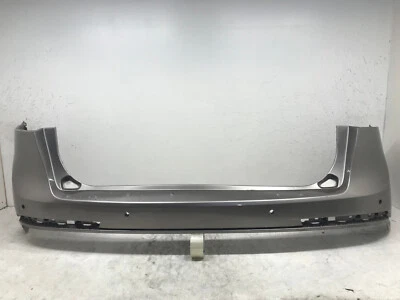 Cubierta de parachoques trasero dorada Lincoln MKX 2016-2018 estreno/reserva con orificios de sensor OEM Foto 1 de 4