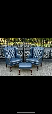 Vintage tufted blue leather high back wing chairs and ottoman By McKinley - Image 1 of 4