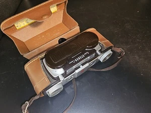 Macchina fotografica Kodak stereo pellicola 35 mm vintage anni 50 con custodia e cinturino in pelle originali - Foto 1 di 6