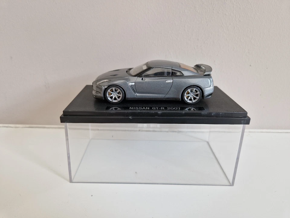 Ebbro 1/43 Nissan GT-R - Grigio scuro metallizzato - 2007 - 44038 - Immagine 1 di 4