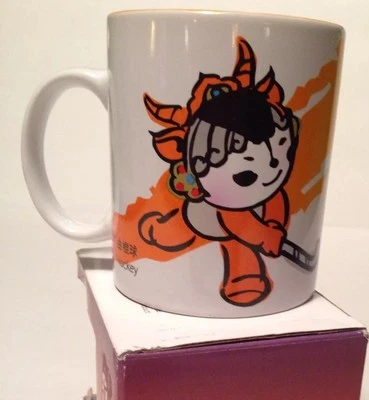 Taza de hockey mascota de los Juegos Olímpicos de Beijing 2008 nueva en caja amistosos porcelana amarilla Foto 1 de 4