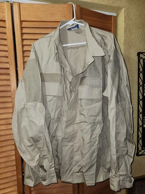 Camisa táctica PROPPER para hombre talla XL/R. Caqui. Manga larga con sujetadores automáticos Foto 1 de 4