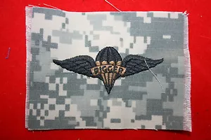 PARACAÍDAS PARACAÍDAS ORIGINAL DEL EJÉRCITO EDICIÓN DE ESTADOS UNIDOS ALA AEROTRANSPORTADA EN CAMUFLAJE ACU - Imagen 1 de 1