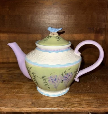 Tetera verde lavanda marfil púrpura glicinia interiores del hogar Foto 1 de 3