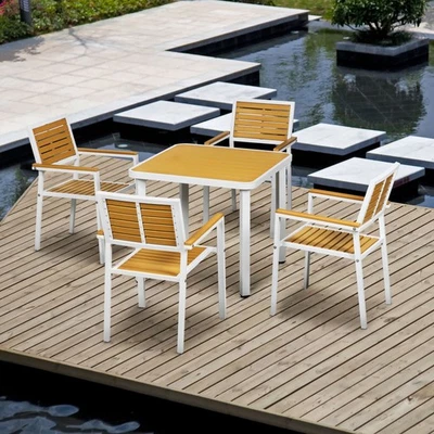 5 Pieces Outdoor Table and Chairs w/ Stackable Chairs, Yellow - Image 1 of 4