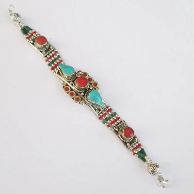 Handmade Tibetan Silver bracelet featuring round Turquoise and Coral gemstones - Image 1 of 4