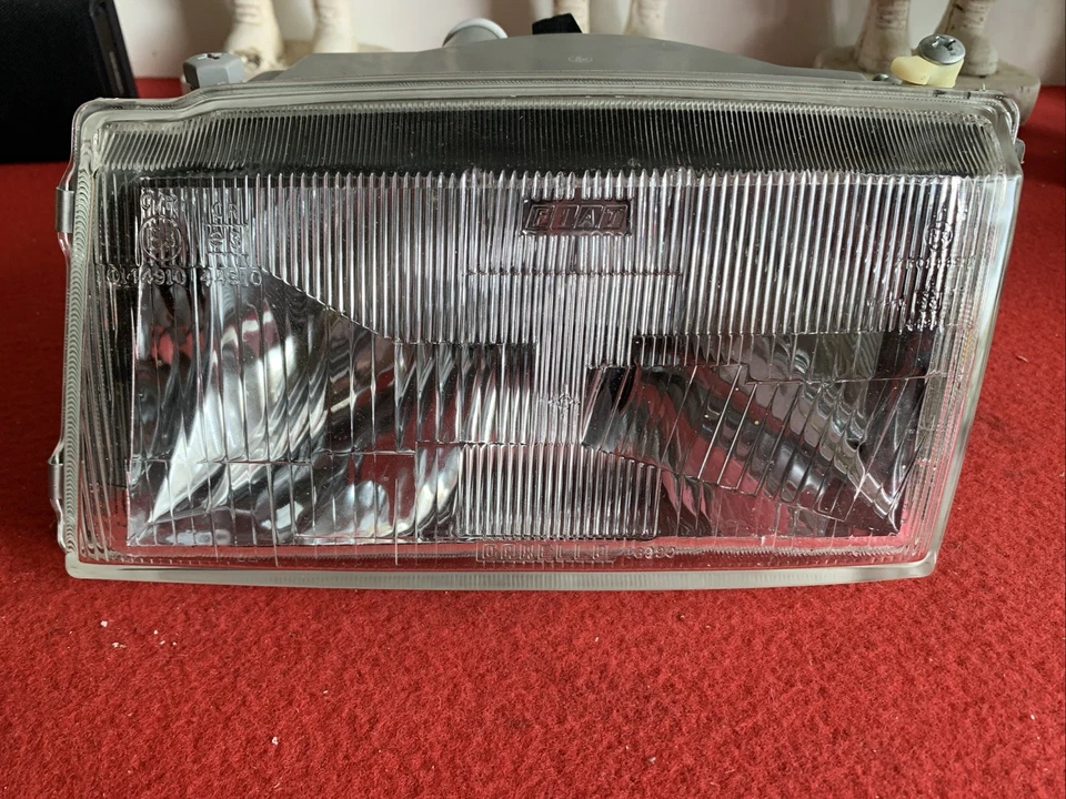 FARO PROIETTORE PRINCIPALE ANT SX CARELLO ORIGINALE FIAT UNO R/89 - FIAT 7694968 - Imagen 1 de 4
