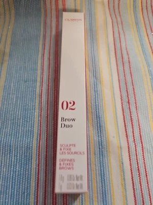 Clarins Brow DUO define y fija (02) castaño rojizo todo tipo de piel 0,03 OZ NUEVO Foto 1 de 3