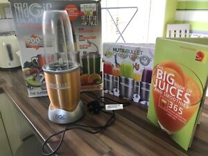 NutriBullet Magic 900 series , copper and silver 2 books all used twice