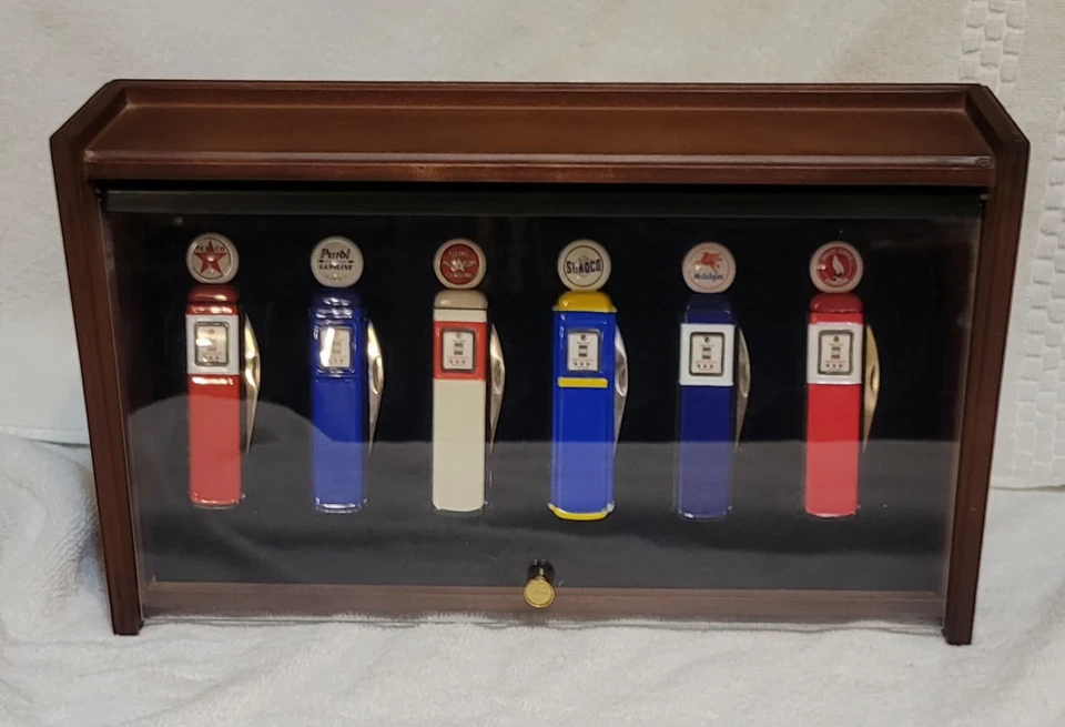 Franklin Mint Gas Pump Pocket Knives set housed in a wooden display case Vintage - Image 1 of 4