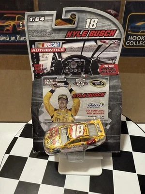 Kyle Busch #18 Kansas Speedway M&M's Red Nose Day NASCAR Authentics 1:64 Wave 3 - Image 1 of 4