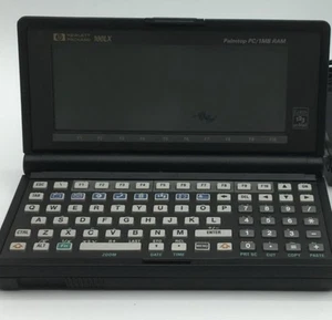 HP 100LX 1 MB RAM Palmtop PC - Handheld - DOS PDA Pocket PC (F1020A#ABA) - Picture 1 of 5