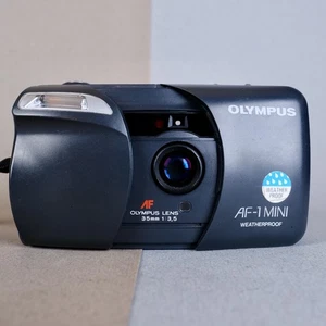 Olympus AF-1 Mini 35mm 1:3.5 Film Point and Shoot Wetterfeste Vintage Kamera - Bild 1 von 9
