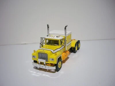 PRIMERA MARCHA DCP 1/64 AMARILLO Y BLANCO MACK MODELO R TRACTOR CON CAMA Foto 1 de 4