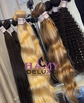 Extensiones de trama gruesas de tejido de cabello humano virgen rubio brasileño 24 26 28 Foto 1 de 4