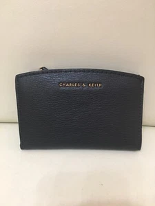 Charles & Keith ladies black faux leather folding purse - Picture 1 of 9