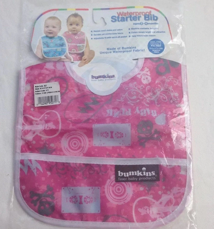 Babero de iniciación impermeable Bumkins rosa diseño caos urbano cierre a presión y palo Foto 1 de 4