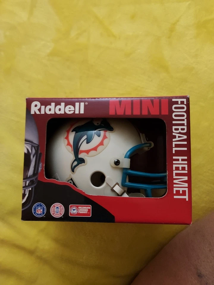 Mini casco de fútbol americano Riddell 1995 NFL Miami Dolphins CON BARBIJO raro nuevo en caja Foto 1 de 4