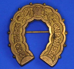 1885 "God Bless Our Queen" Victoria brass horseshoe brooch, RN 20094 [28481]