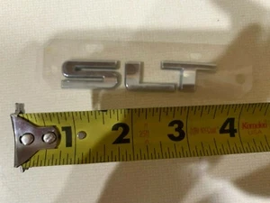 GM SLT LETTERS  SYMBOL EMBLEM OEM CHROME USED - Picture 1 of 1