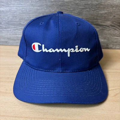 Gorra Champion vintage con cierre a presión azul deletreada ajustable Foto 1 de 4