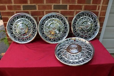 75-85 CADILLAC DEVILLE FLEETWOOD SEVILLE NOS 15" TAPACUBOS DE ALAMBRE GM # 1612480 Foto 1 de 4