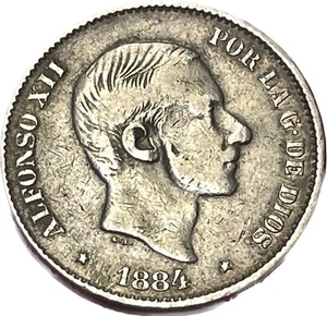 ESPAÑA 50 Centavos de Peso del año 1884 Alfonso XII ceca de Manila Filipinas - Imagen 1 de 3