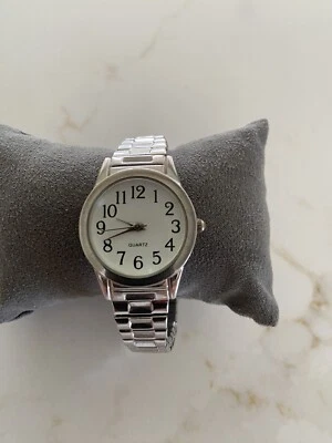 Reloj de cuarzo para mujer FÁCIL DE LEER banda elástica tono plateado funciona muy bien Foto 1 de 4