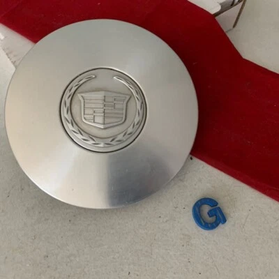#G 1) Tapa central de rueda 96-01 Cadillac Deville Seville OEM P/N 9594600  Foto 1 de 4