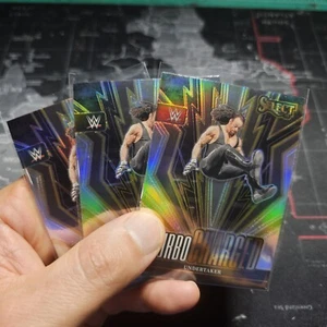 24 2024 Panini Select WWF WWE #26 Turbo CHARGED The Undertaker Silver Prizms  - Picture 1 of 2