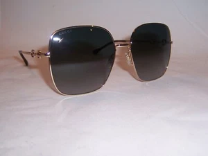 NUEVAS GAFAS DE SOL GUCCI GG 0879S 001 DORADAS/GRIS AUTÉNTICAS 0879 - Imagen 1 de 8