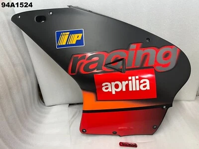 APRILIA RS 50 1999 - 2005 PANEL LATERAL DERECHO NUEVO ORIGINAL OEM LOTE 94A1524 Foto 1 de 4