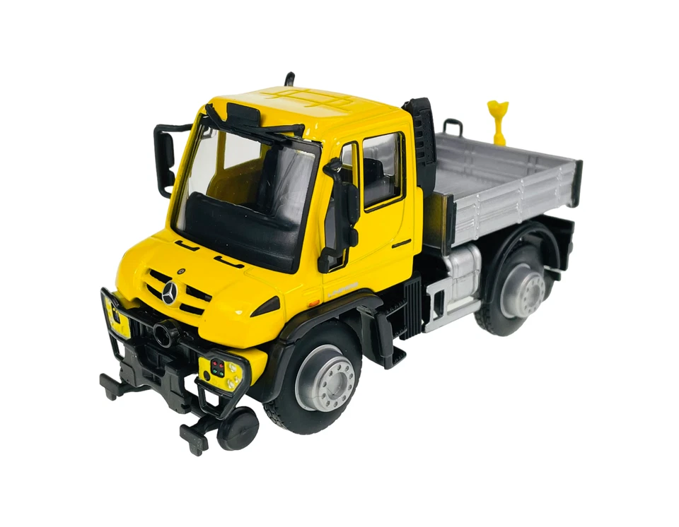 MAISTO MERCEDES-BENZ UNIMOG YELLOW 1:43 DIE CAST METAL MODEL NEW IN BOX  - Image 1 of 4