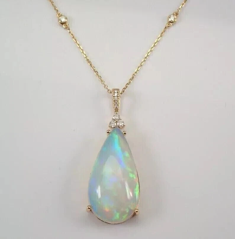 Colgante solitario 925 chapado en oro amarillo de 14 k ópalo de fuego natural corte pera de 3 quilates Foto 1 de 4