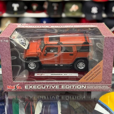 Maisto Hummer H2 Orange 1/18 Scale Diecast Model Car | Executive Edition Wood - Image 1 of 4