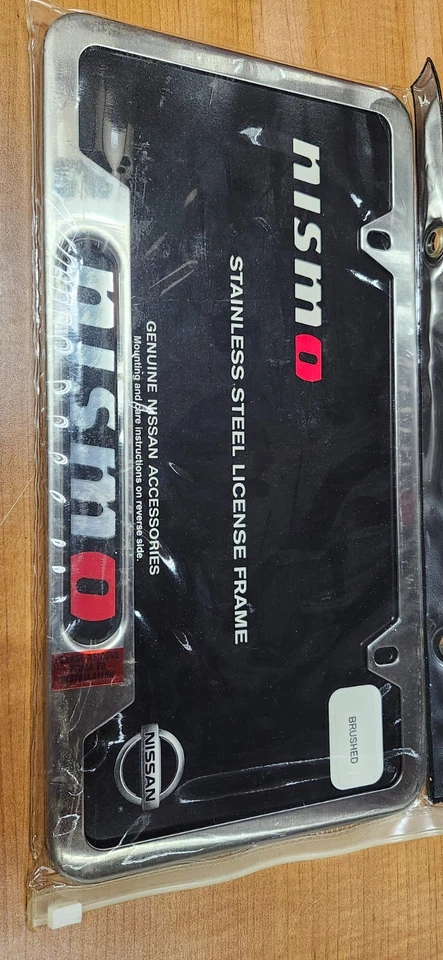 Marco de matrícula genuino Nissan Nismo - Parte # 999MB-SP005AS - Descontinuado Foto 1 de 2