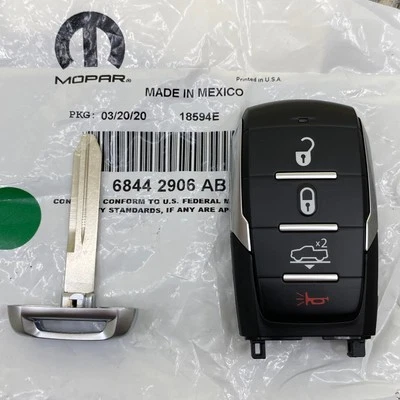 New RAM 1500 Key Fob Remote Oem - 2019-2022-  4 Button - 68442906 w/ Insert - Image 1 of 4