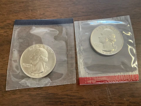 1986-P and 1986-D Gem BU Washington Quarters in Original Mint Cello Packs Cover