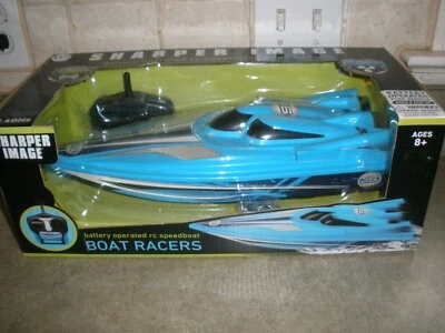 NEW Blue Sharper Image Battery Operated RC Boat Racer Wireless 2.4 GHZ - Image 1 of 4