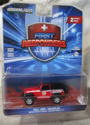 Jeep Wrangler 2011 salvavidas Greenlight Volusia County FL 1:64 con neumáticos de goma Foto 1 de 4
