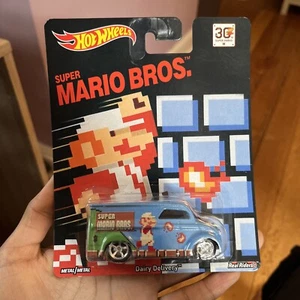 New/sealed Hot Wheels 2015 Release SUPER MARIO BROS. DAIRY DELIVERY Real Riders - Picture 1 of 9