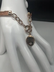GUESS Logo Charm Gold Tone Glittered Oval link Chain Toggle Closure Bracelet - Picture 1 of 10