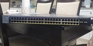 Netgear GS752TPv2 48 Port Gigabit POE + Smart Managed Pro Switch 4 SFP Port - Picture 1 of 9